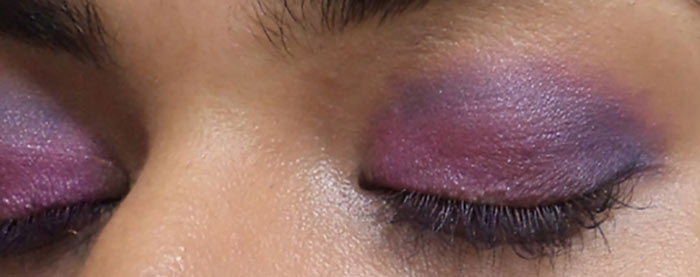 Purple eye makeup step 6 is to blend the blue shade Purple eye makeup step 6 is to blend the blue shade