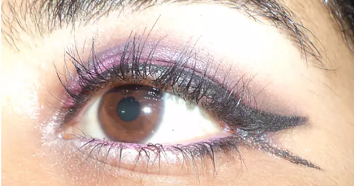 Purple eye makeup step 15 is to apply mascara