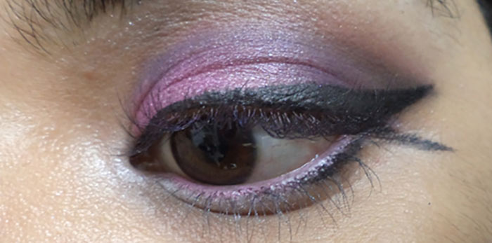 Purple eye makeup step 13 is to line your waterline Purple eye makeup step 13 is to line your waterline