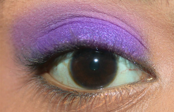Purple eye makeup step 18 is to apply bright purple eyeshadow in a satin finish Purple eye makeup step 18 is to apply bright purple eyeshadow in a satin finish