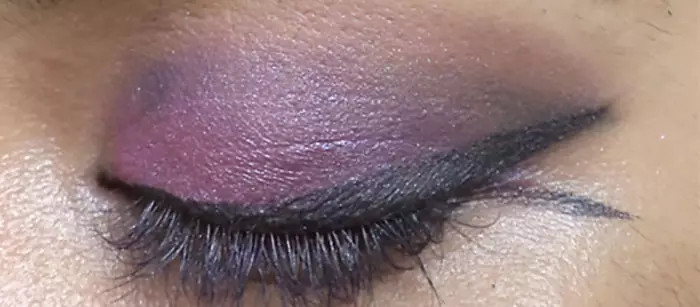 Purple eye makeup step 11 is to add pink above the crease