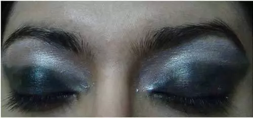 Apply a Shimmer White Shadow - Black Eye Makeup