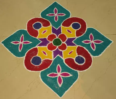 Freehand flower rangoli design for entrances