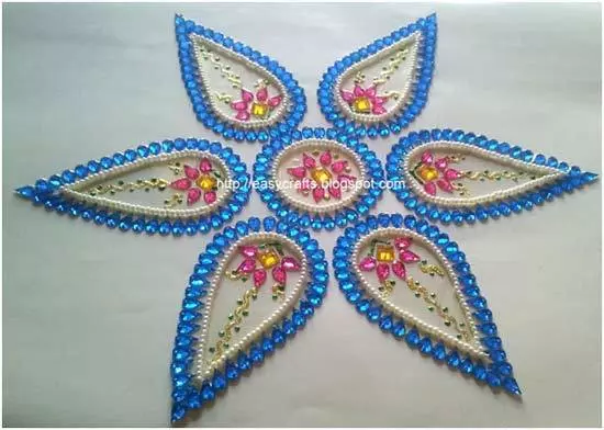 blue kundan rangoli