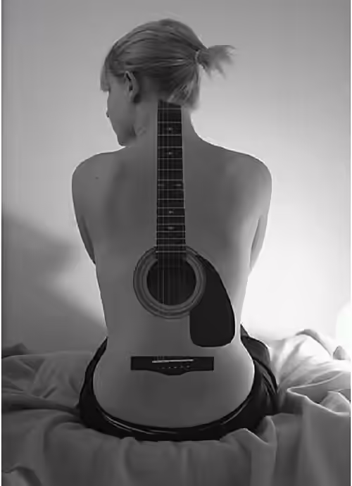 guitar tattoo on back