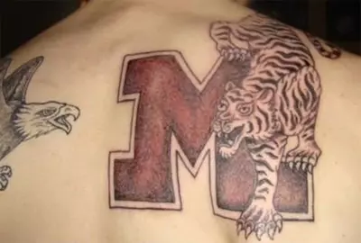 Football logo tattoo