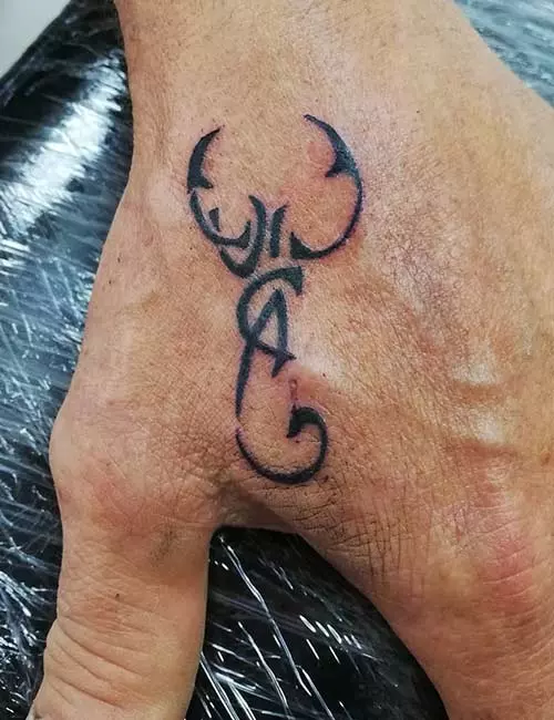 Tiny Scorpion Tattoo