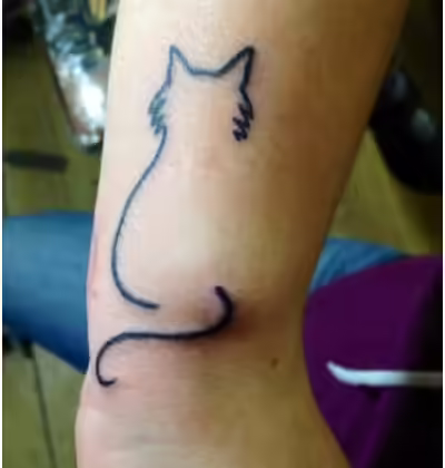 cat outline tattoo
