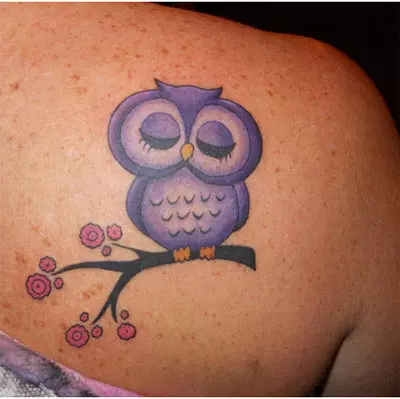 demure owl tattoo