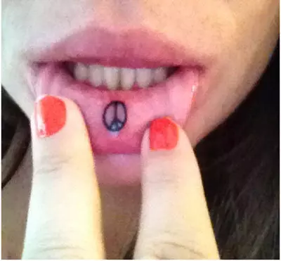 on the lips tattoo