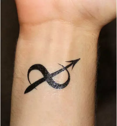 piercing arrow tattoo