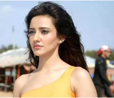 The bikini clad look of Neha Sharma without makeup