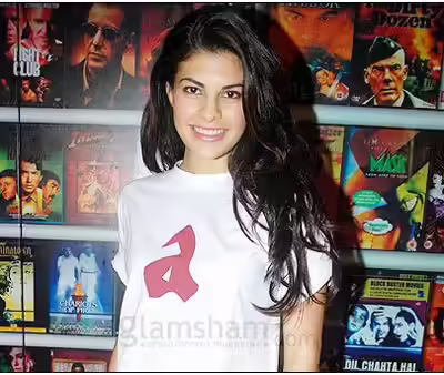 Jacqueline Fernandez shopping for good movies without makeup