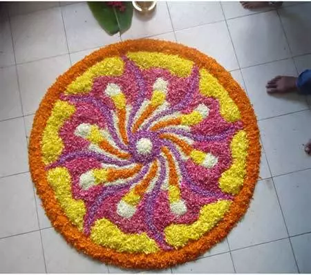 Pleasing pookalam design for Onam