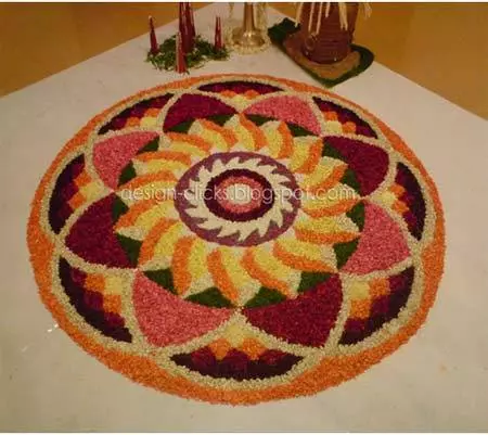 Pretty pookalam design for Onam