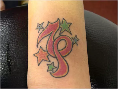 Capricorn music tattoo