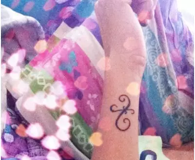 Miniature Pisces Symbol Tattoo