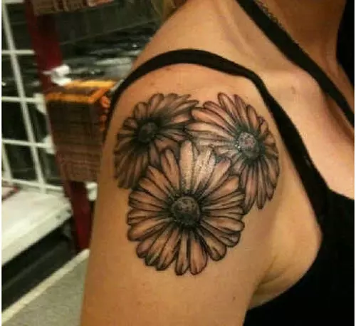 Multiple Daisies Shoulder Tattoo