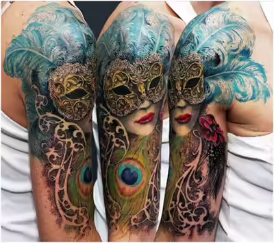 Peacock mask tattoo