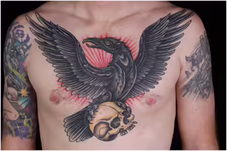 Raven Holding A Skull Tattoo Raven Holding A Skull Tattoo
