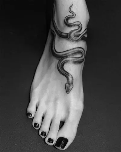 snake foot tattoo