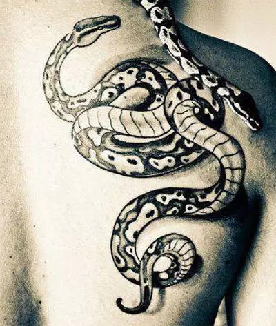 snake upper back tattoo