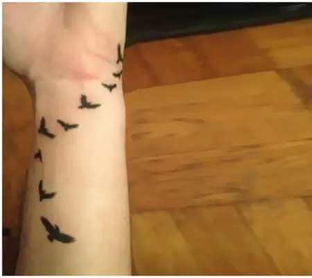 Swarm Of Ravens Tattoo