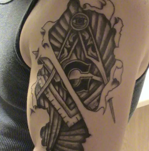 symbolic masonic upper arm tattoo