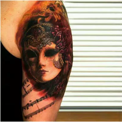 Vampire mask tattoo