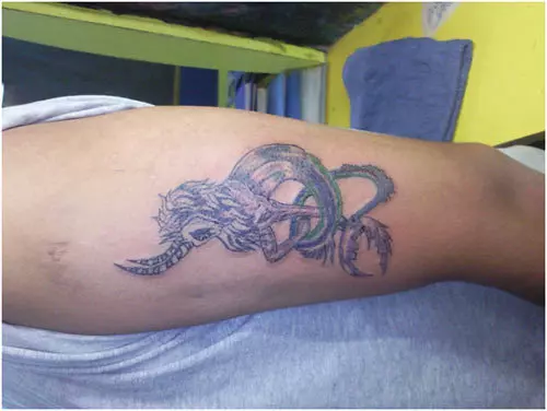 capricorn dragon tattoo