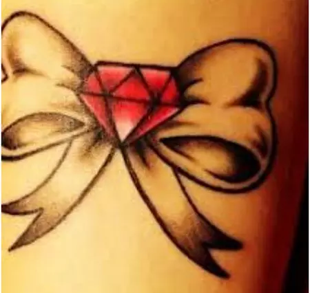 diamond and bow tattoo