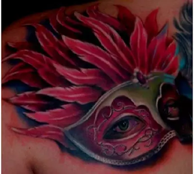 feather mask tattoo