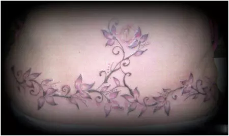 flower stomach tattoos