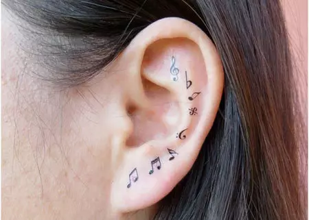 music notes ear tattoo