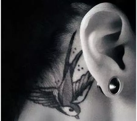 sparrow ear tattoo