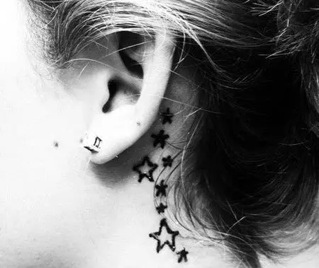 stars behind ear tattoo