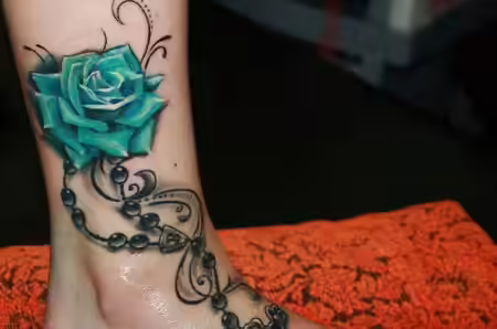 Beads, cross and rose tattoo Beads, cross and rose tattoo