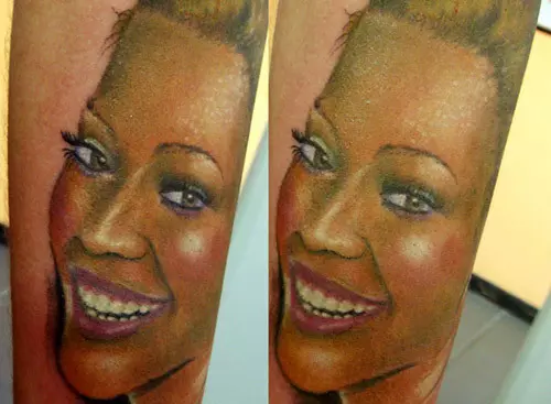 beyonce’s half face laughing tattoo