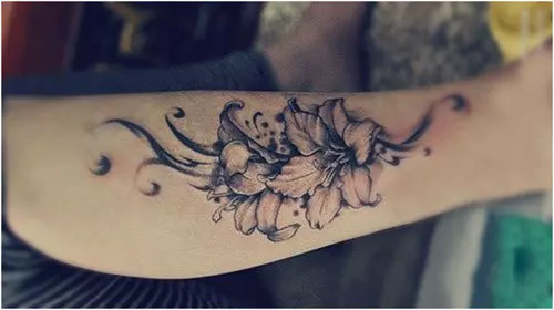 Black and white lily tattoo