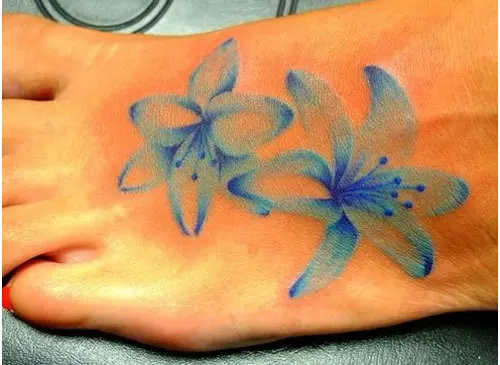 Blue lilies tattoo