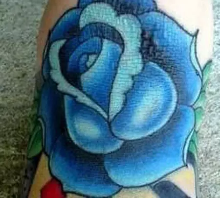 Dice and roses tattoo