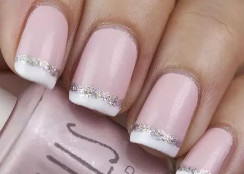 7. Glittering French Tips Nail Design