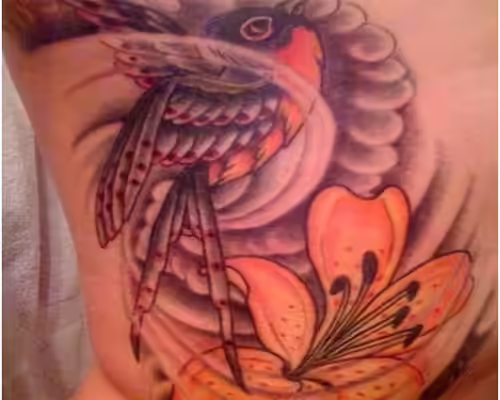 Lily with hummingbird tattoo Lily with hummingbird tattoo