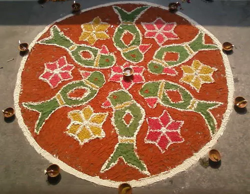 North Indian rangoli designs with parrots and diyas