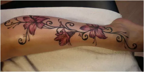 Pink lily with stripes tattoo