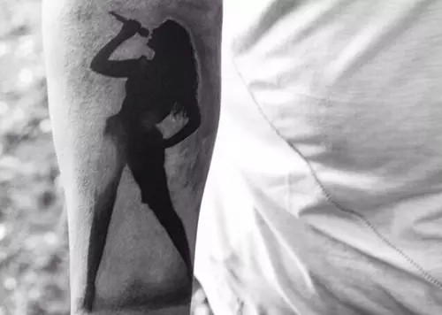 silhouette of beyonce singing tattoo