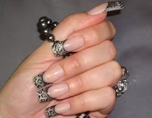 French Tips in Leopard Print Nail Art 6. French Tips in Leopard Print Nail Art Designs