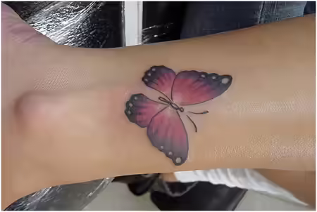 pink butterfly tattoo pink butterfly tattoo