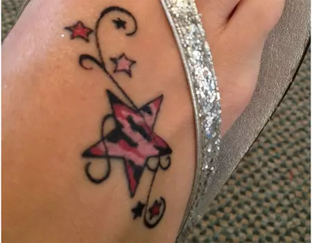 pink zebra star tattoo