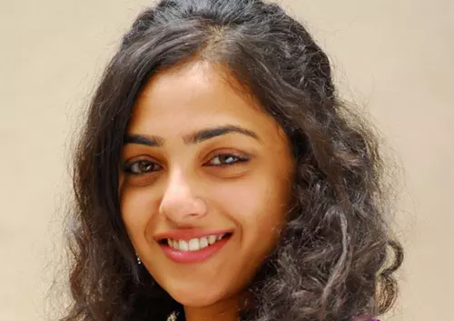 Nithya Menon without makeup in a simple hairstyle